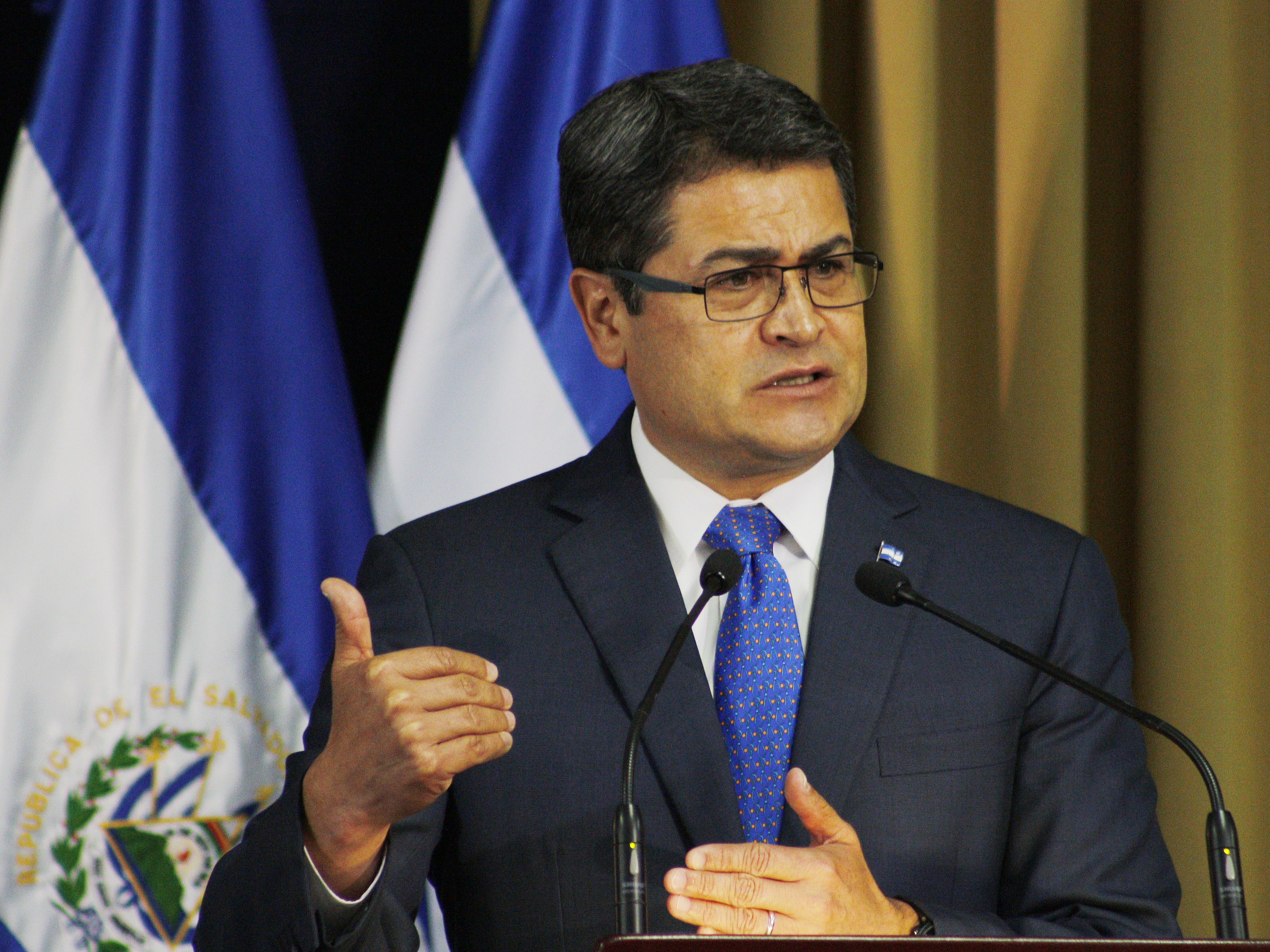 Then-Honduran President Juan Orlando Hernandez gives an speech in San Salvador, El Salvador.